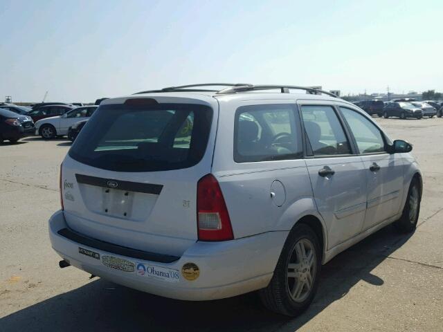 1FAFP3630YW345956 - 2000 FORD FOCUS WHITE photo 4