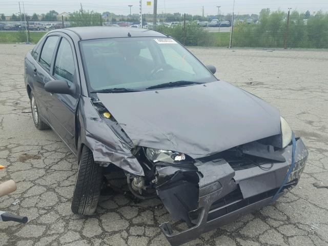 1FAFP34N77W207009 - 2007 FORD FOCUS ZX4 GRAY photo 1