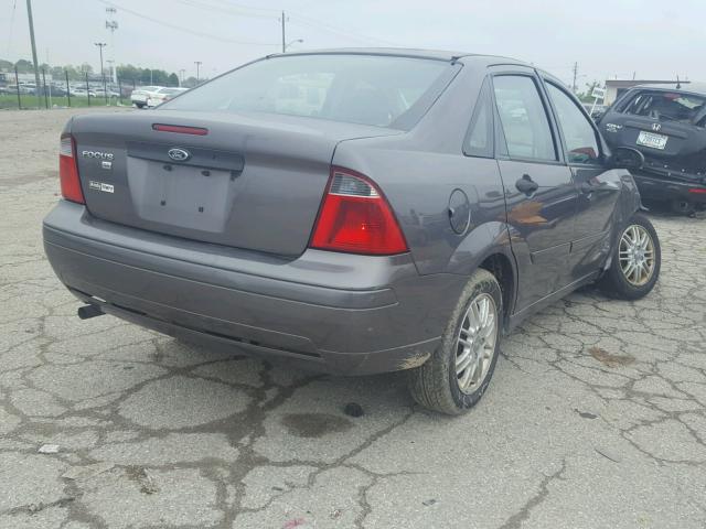 1FAFP34N77W207009 - 2007 FORD FOCUS ZX4 GRAY photo 4