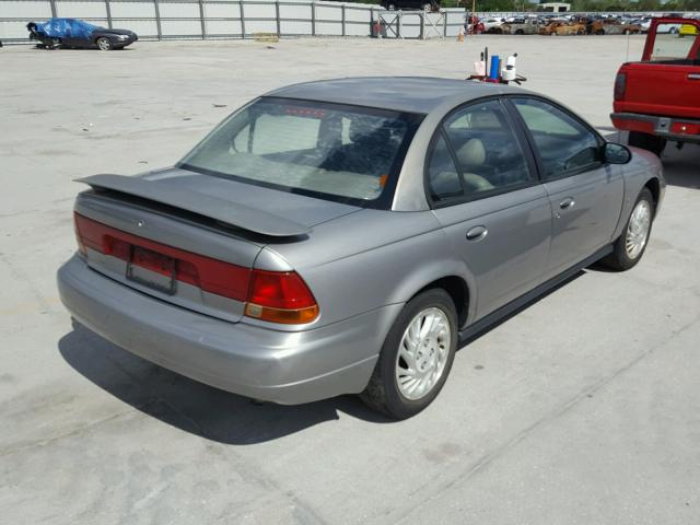 1G8ZJ5279XZ183457 - 1999 SATURN SL2 GRAY photo 4