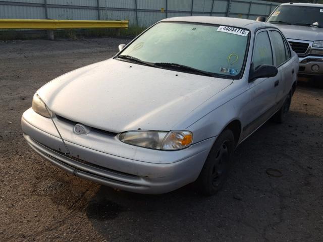 1Y1SK5287XZ430886 - 1999 CHEVROLET GEO PRIZM GRAY photo 2