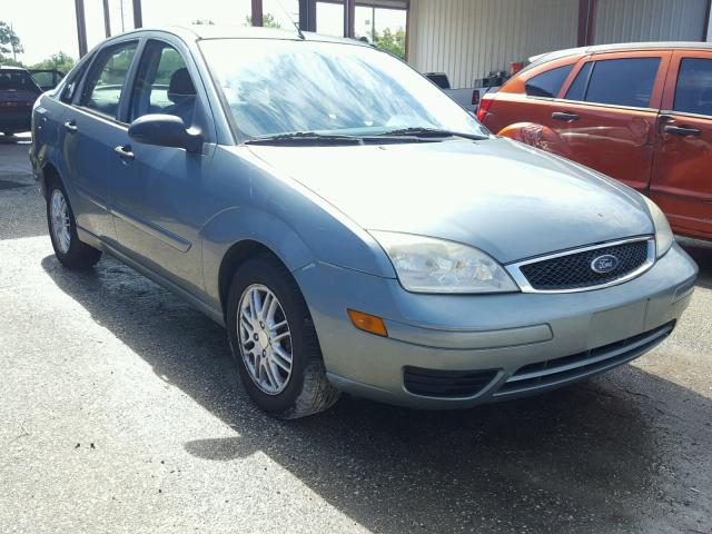 1FAFP34N35W228517 - 2005 FORD FOCUS ZX4 GRAY photo 1