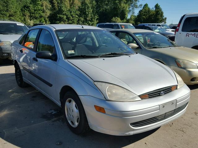 1FAFP33P0YW282039 - 2000 FORD FOCUS LX SILVER photo 1