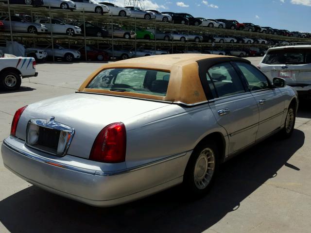 1LNHM81W42Y631505 - 2002 LINCOLN TOWN CAR E SILVER photo 4