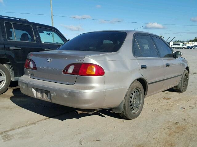 2T1BR12E7XC165735 - 1999 TOYOTA COROLLA TAN photo 4