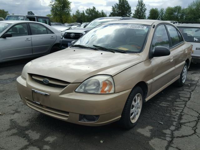 KNADC125536231059 - 2003 KIA RIO GOLD photo 2