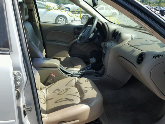 1G2NE52E3XM881734 - 1999 PONTIAC GRAND AM S ნაცრისფერი ფოტო 5