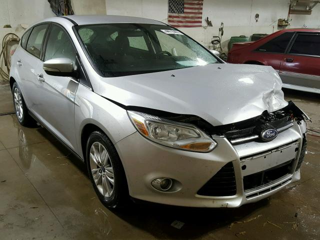 1FAHP3M2XCL283768 - 2012 FORD FOCUS SILVER photo 1