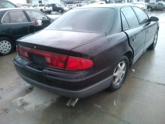 2G4WF551XY1119144 - 2000 BUICK REGAL GS BLACK photo 4