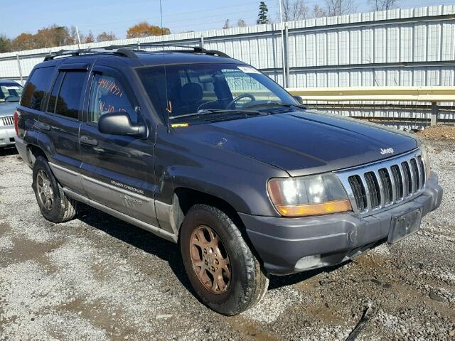 1J4GW58S5XC722146 - 1999 JEEP GRAND CHER GRAY photo 1