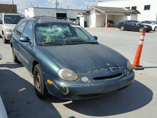 1FALP57U8VA211887 - 1997 FORD TAURUS GL GREEN photo 1