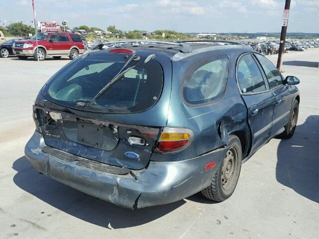 1FALP57U8VA211887 - 1997 FORD TAURUS GL GREEN photo 4