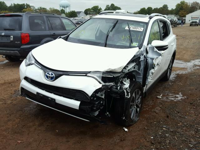 JTMRJREV3GD021120 - 2016 TOYOTA RAV4 HV WHITE photo 2