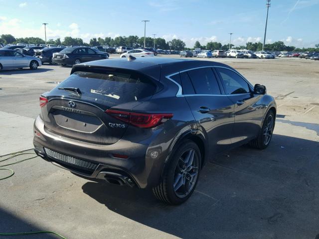 SJKCH5CPXHA021209 - 2017 INFINITI QX30 BASE BROWN photo 4