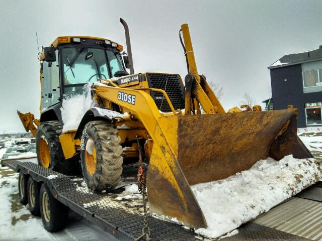 T0310SE833246 - 1997 JOHN DEERE 310SE YELLOW photo 1