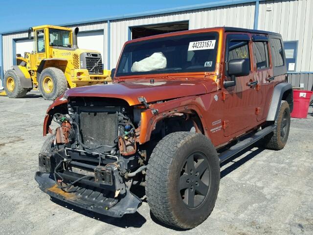 1J4BA3H10AL221225 - 2010 JEEP WRANGLER U ORANGE photo 2