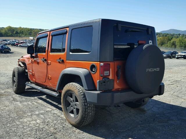 1J4BA3H10AL221225 - 2010 JEEP WRANGLER U ORANGE photo 3