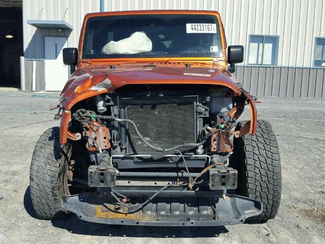 1J4BA3H10AL221225 - 2010 JEEP WRANGLER U ORANGE photo 9