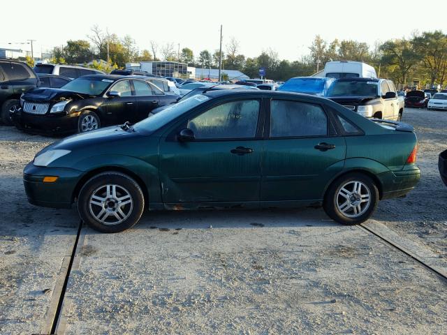 1FAFP3437YW140492 - 2000 FORD FOCUS SE GREEN photo 9