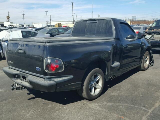 2FTRF07393CA87481 - 2003 FORD F150 SVT L BLACK photo 4