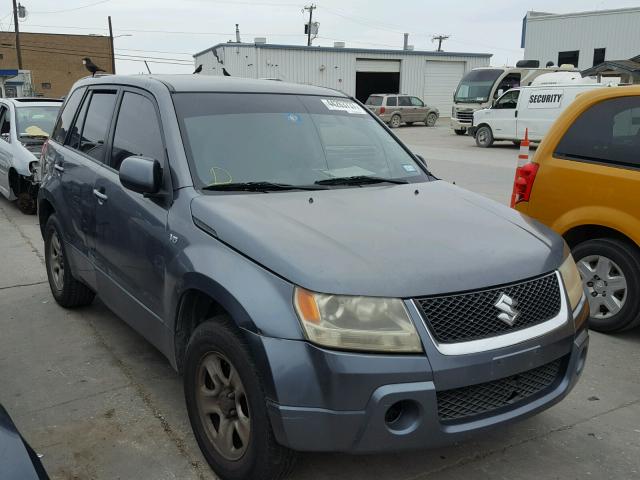 JS3TE941674203646 - 2007 SUZUKI GRAND VITA GRAY photo 1