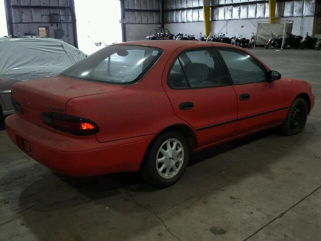 1Y1SK5286SZ005670 - 1995 GEO PRIZM LSI RED photo 4