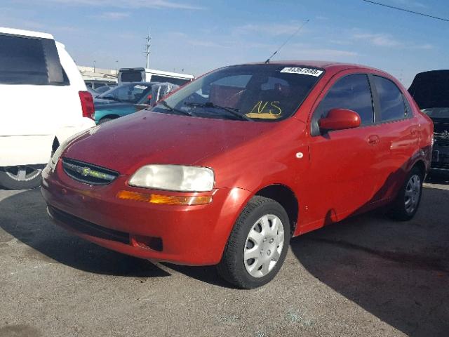 KL1TD56606B625321 - 2006 CHEVROLET AVEO BASE Czerwony zdjęcie 2