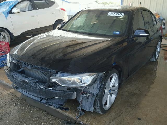 WBA3A9G59CNN67568 - 2012 BMW 335 I BLACK photo 2