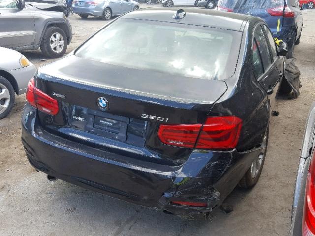 WBA8E5G5XJNU47777 - 2018 BMW 320 XI BLACK photo 4