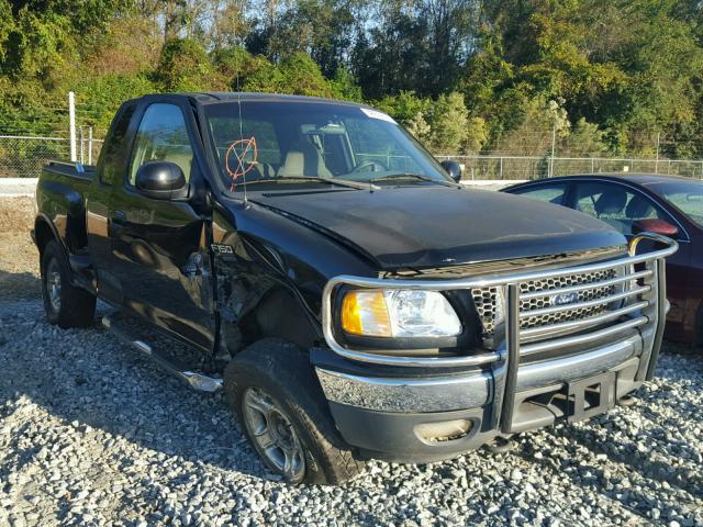 2FTRX08L6XCA87665 - 1999 FORD F150 BLACK photo 1