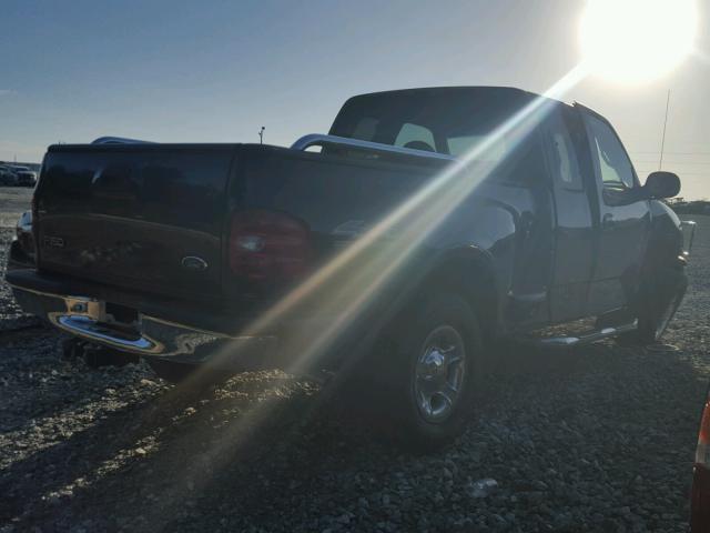 2FTRX08L6XCA87665 - 1999 FORD F150 BLACK photo 4