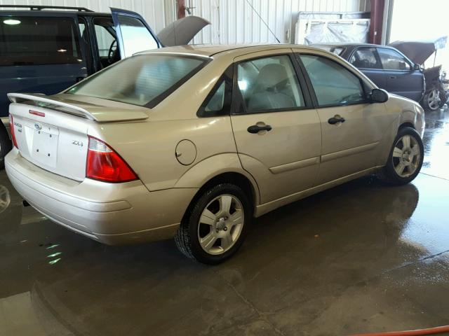 1FAFP34N96W161844 - 2006 FORD FOCUS ZX4 TAN photo 4