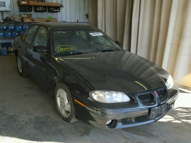 1G2NW52M4VC789863 - 1997 PONTIAC GRAND AM G BLACK photo 1