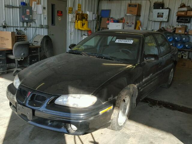 1G2NW52M4VC789863 - 1997 PONTIAC GRAND AM G BLACK photo 2