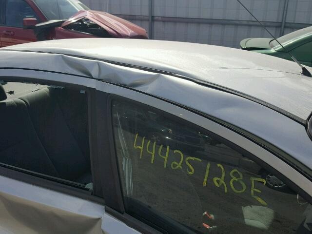 KL1TD52695B459790 - 2005 CHEVROLET AVEO BASE Srebrny zdjęcie 10