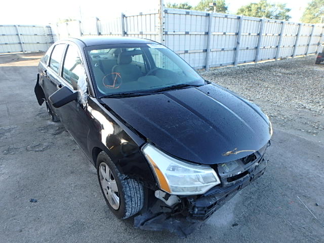 1FAHP34N38W231396 - 2008 FORD FOCUS S/SE BLACK photo 1