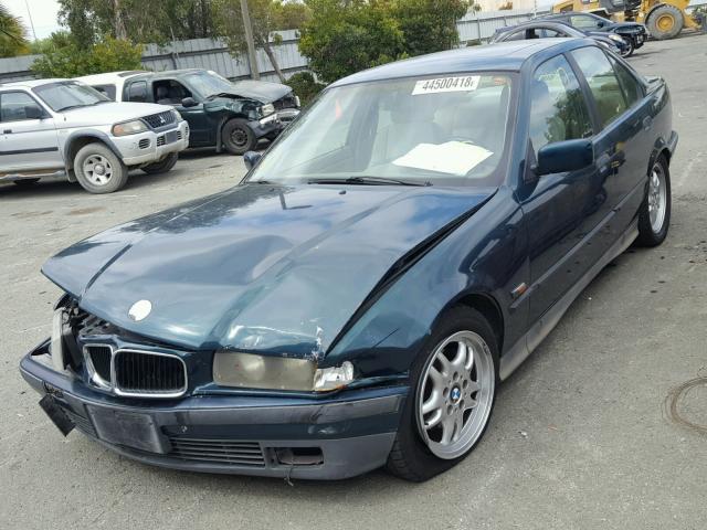 WBACB432XSFM08045 - 1995 BMW 325 I AUTO GREEN photo 2