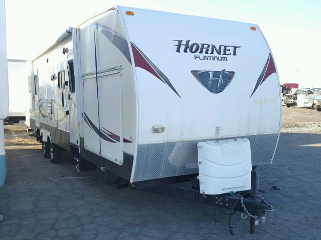 4YDT32B27C7200381 - 2012 KEYSTONE HORNET WHITE photo 1