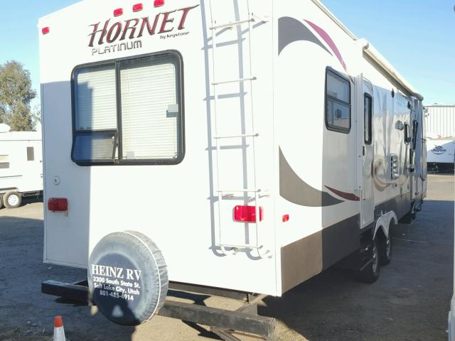 4YDT32B27C7200381 - 2012 KEYSTONE HORNET WHITE photo 4