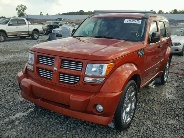 1D8GT58697W680372 - 2007 DODGE NITRO R/T ORANGE photo 2