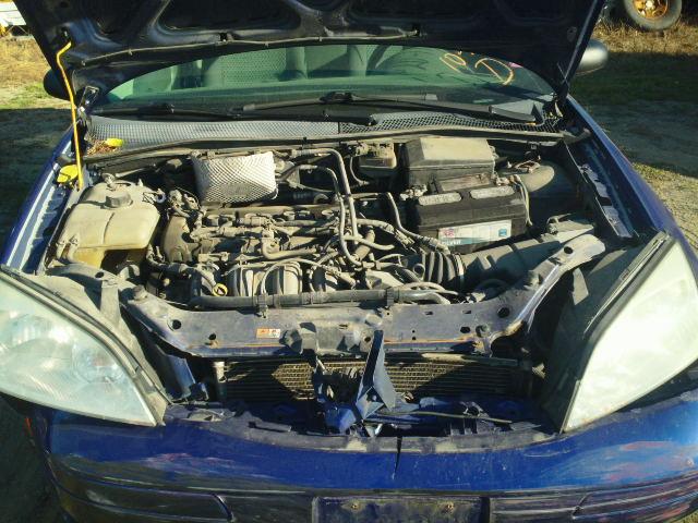 1FAFP34N55W181412 - 2005 FORD FOCUS ZX4 BLUE photo 7