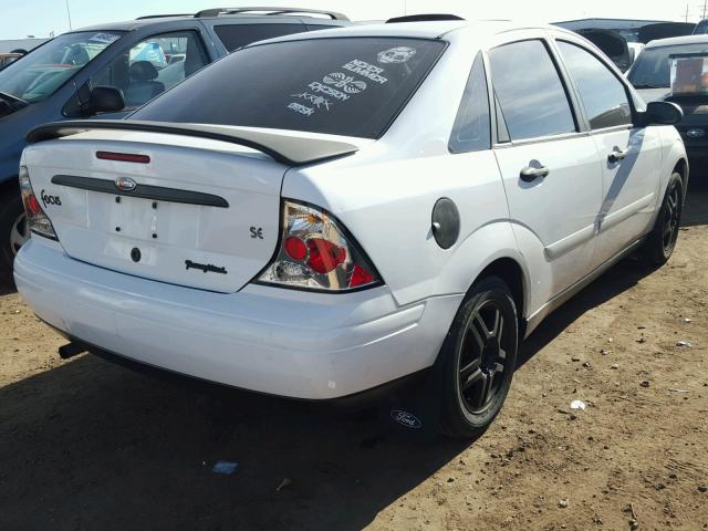 1FAFP3430YW310532 - 2000 FORD FOCUS WHITE photo 4