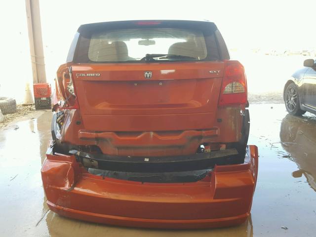 1B3HB48B07D154366 - 2007 DODGE CALIBER SX ORANGE photo 9