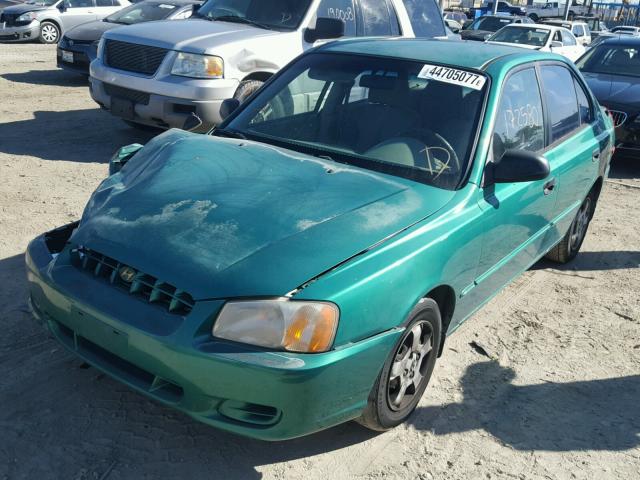 KMHCG45C51U173845 - 2001 HYUNDAI ACCENT GREEN photo 2