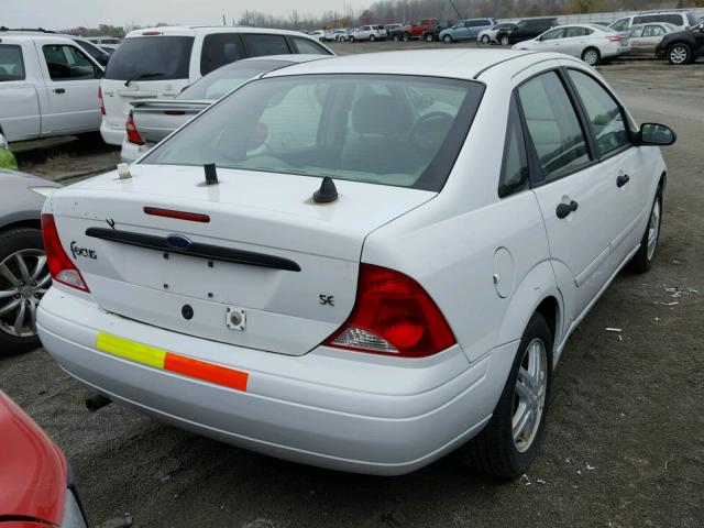 1FAFP34PX1W266726 - 2001 FORD FOCUS SE WHITE photo 4