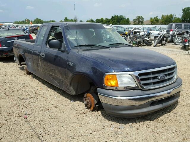 2FTRX17284CA79657 - 2004 FORD F-150 HERI BLUE photo 1