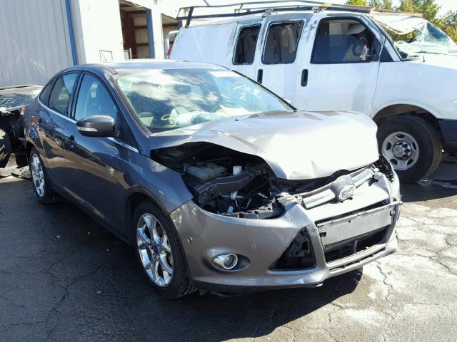 1FAHP3H23CL286909 - 2012 FORD FOCUS GRAY photo 1