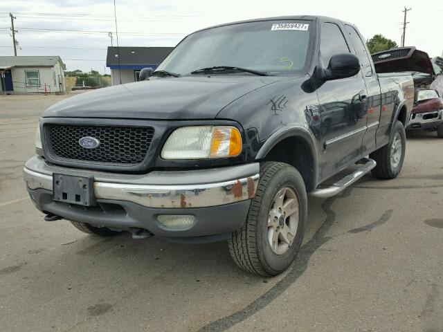 1FTRX18L32NA56933 - 2002 FORD F150 BLACK photo 2