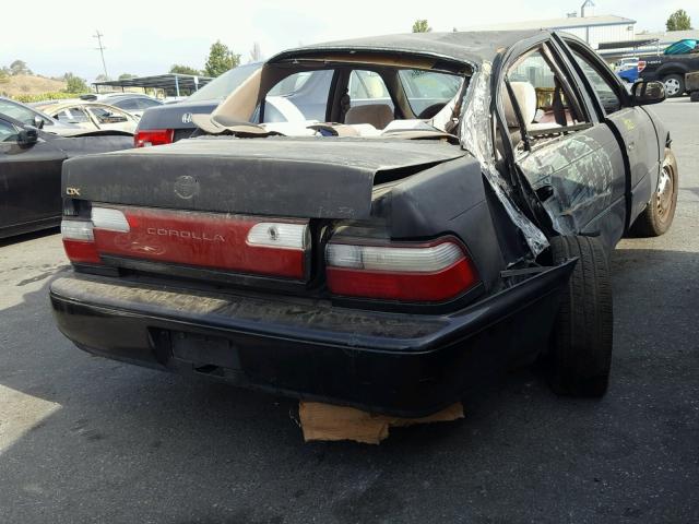 1NXBB02E1VZ569575 - 1997 TOYOTA COROLLA DX BLACK photo 4