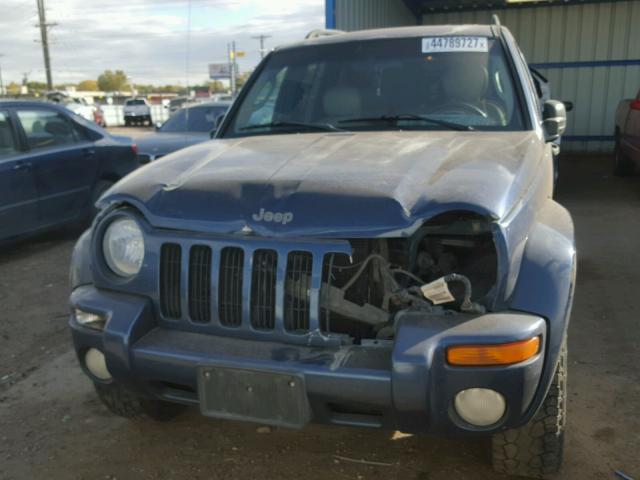 1J8GL58KX4W117055 - 2004 JEEP LIBERTY LI BLUE photo 9